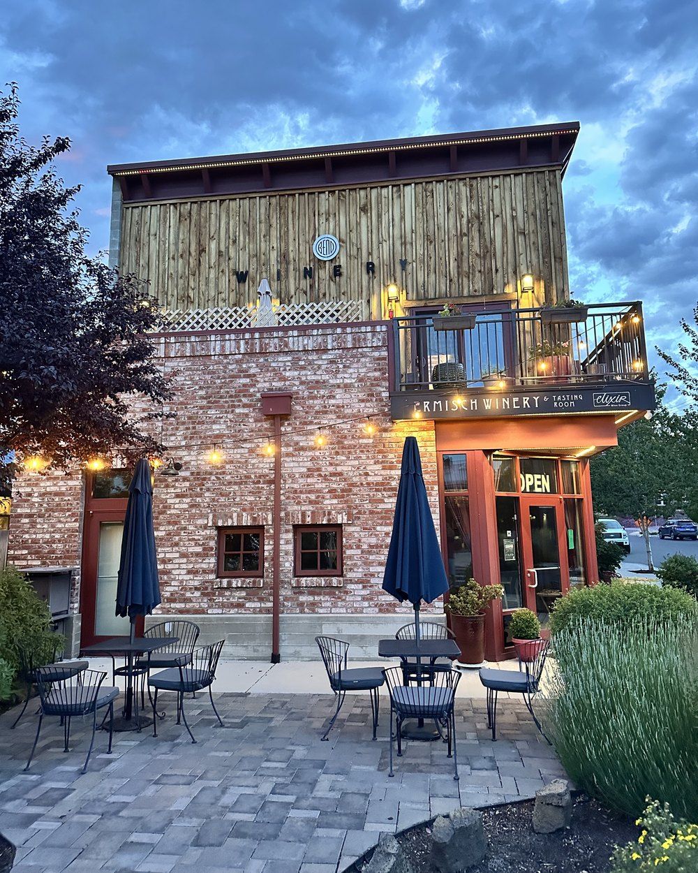Ermisch Winery and Tasting Room on NW Lava Road in Bend, Oregon, at dusk